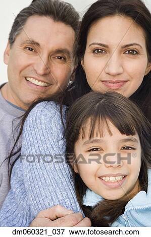 Close up of Hispanic family smiling View Large Photo Image Stock Photo - Close up of Hispanic family smiling. Fotosearch