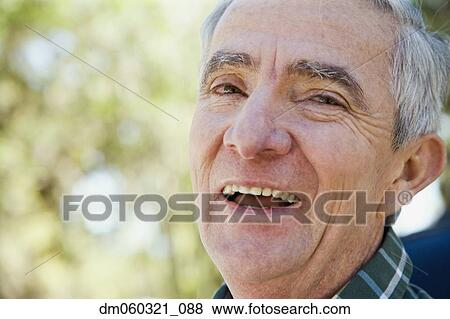 Stock Photo - Close up of senior Hispanic man laughing. Fotosearch