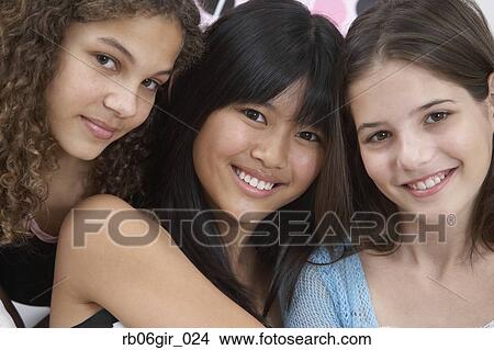 Close up of three girls smiling View Large Photo Image Picture - Close up of three girls smiling. Fotosearch