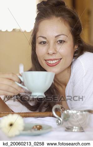 Close up of woman drinking tea View Large Photo Image Stock Photo - Close up of woman drinking tea. Fotosearch