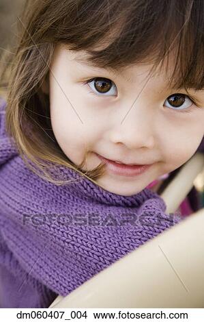 Close up of young Asian girl smiling View Large Photo Image Picture - Close up of young Asian girl smiling. Fotosearch