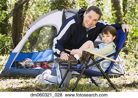 Father and daughter camping View Large Photo Image Stock Photo - Father and daughter camping. Fotosearch