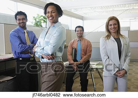 Group of coworkers in office View Large Photo Image Stock Image - Group of coworkers in office. Fotosearch