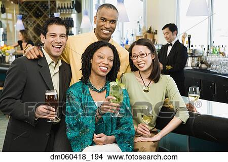 Group of friends at bar View Large Photo Image Picture - Group of friends at bar. Fotosearch