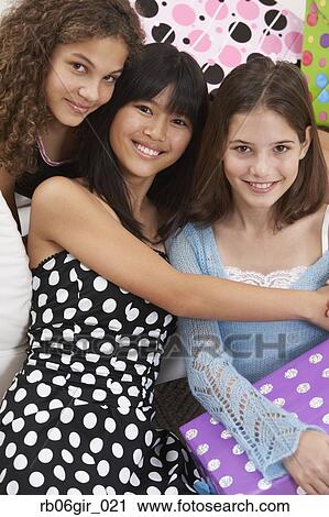 Group of teenaged girls with gifts View Large Photo Image Stock Image - Group of teenaged girls with gifts. Fotosearch