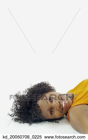 Portrait of woman laying on floor View Large Photo Image Stock Photography - Portrait of woman laying on floor. Fotosearch