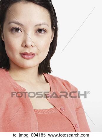 Stock Photography - Studio shot close up of Asian woman. Fotosearch
