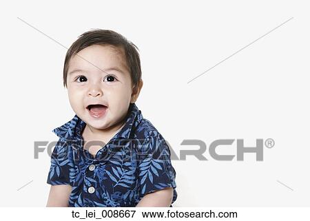 Studio shot of toddler boy smiling View Large Photo Image Stock Photo - Studio shot of toddler boy smiling. Fotosearch