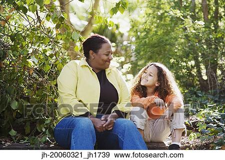African mother and daughter in woods View Large Photo Image Stock Photo - African mother and daughter in woods. Fotosearch