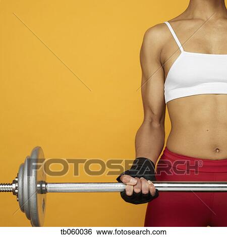 African woman lifting weights View Large Photo Image Stock Photograph - African woman lifting weights. Fotosearch
