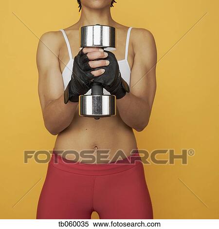 African woman lifting weights View Large Photo Image Stock Photography - African woman lifting weights. Fotosearch