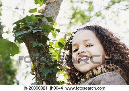 Young African girl with braces smiling View Large Photo Image Picture - Young African girl with braces smiling. Fotosearch