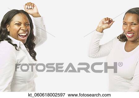 Adult African sisters laughing and dancing View Large Photo Image Stock Photo - Adult African sisters laughing and dancing. Fotosearch