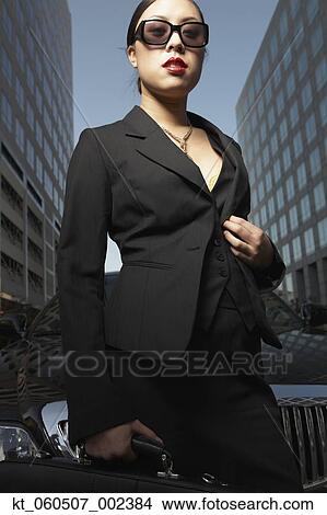 Asian businesswoman outdoors View Large Photo Image Picture - Asian businesswoman outdoors. Fotosearch