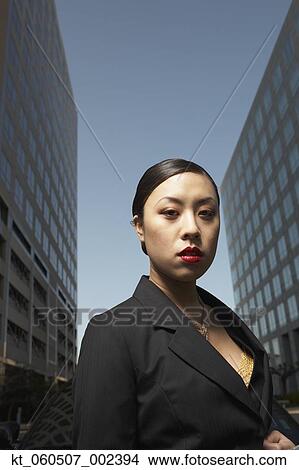 Asian businesswoman outdoors View Large Photo Image Picture - Asian businesswoman outdoors. Fotosearch
