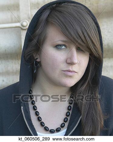 Close up of adolescent female wearing hooded sweatshirt View Large Photo Image Stock Photo - Close up of adolescent female wearing hooded sweatshirt. Fotosearch