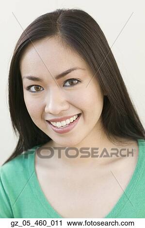 Close up of Asian woman smiling View Large Photo Image Stock Image - Close up of Asian woman smiling. Fotosearch
