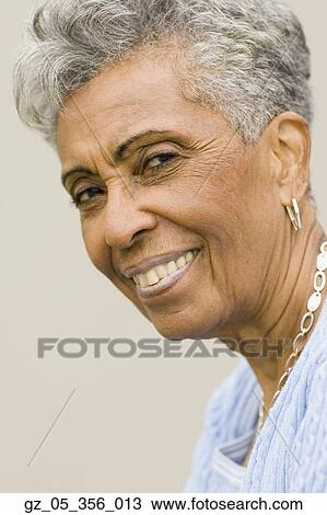 Close up of senior African woman smiling View Large Photo Image Stock Image - Close up of senior African woman smiling. Fotosearch