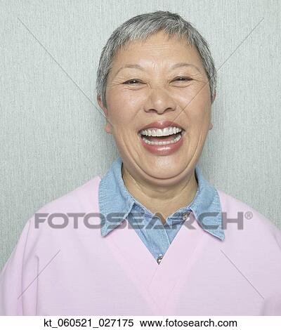 Close up of senior Asian woman laughing View Large Photo Image Stock Photography - Close up of senior Asian woman laughing. Fotosearch