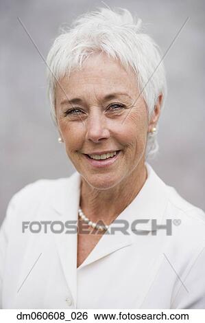 Stock Photograph - Close up of senior woman smiling. Fotosearch