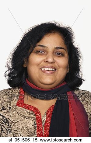 Close up studio shot of Indian woman smiling View Large Photo Image Stock Photography - Close up studio shot of Indian woman smiling. Fotosearch