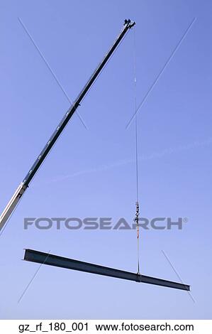Crane holding steel beam View Large Photo Image Stock Image - Crane holding steel beam. Fotosearch