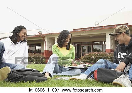 Group of African students studying in grass View Large Photo Image Stock Photo - Group of African students studying in grass. Fotosearch