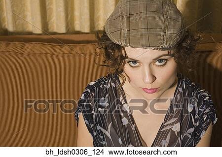High angle view of woman wearing hat View Large Photo Image Picture - High angle view of woman wearing hat. Fotosearch