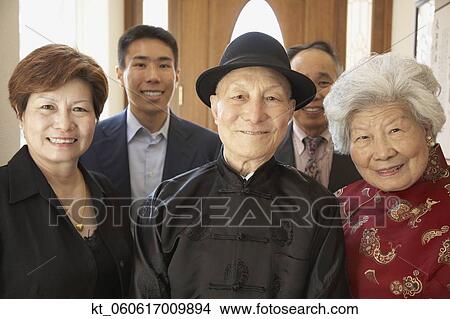 Multi-generational Asian family smiling View Large Photo Image Picture - Multi-generational Asian family smiling. Fotosearch