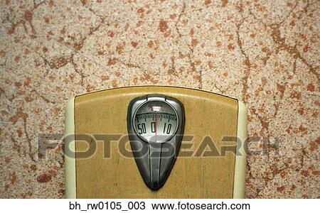 Scale from 1950's on linoleum floor View Large Photo Image Stock Image - Scale from 1950's on linoleum floor. Fotosearch
