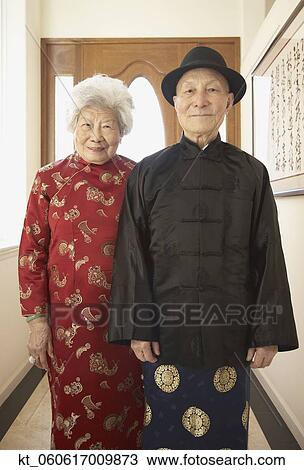 Senior Asian couple in traditional dress indoors View Large Photo Image Stock Image - Senior Asian couple in traditional dress indoors. Fotosearch