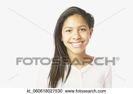 Studio shot of African girl smiling View Large Photo Image Stock Image - Studio shot of African girl smiling. Fotosearch