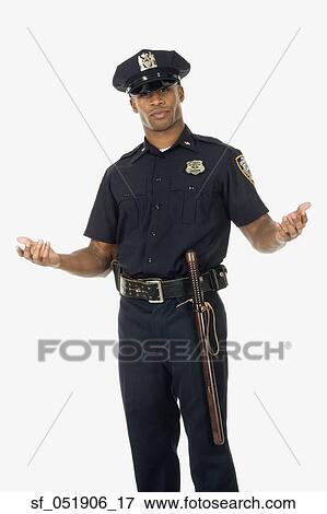 Stock Photo - Studio shot of African male police officer. Fotosearch