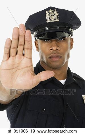 Studio shot of African male police officer View Large Photo Image Stock Photo - Studio shot of African male police officer. Fotosearch