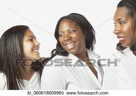 Studio shot of African mother and daughters smiling View Large Photo Image Stock Photography - Studio shot of African mother and daughters smiling. Fotosearch