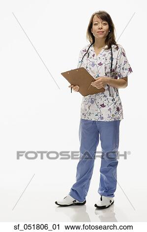 Studio shot of female nurse with chart View Large Photo Image Stock Image - Studio shot of female nurse with chart. Fotosearch