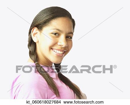 Studio shot of Hispanic girl smiling View Large Photo Image Picture - Studio shot of Hispanic girl smiling. Fotosearch