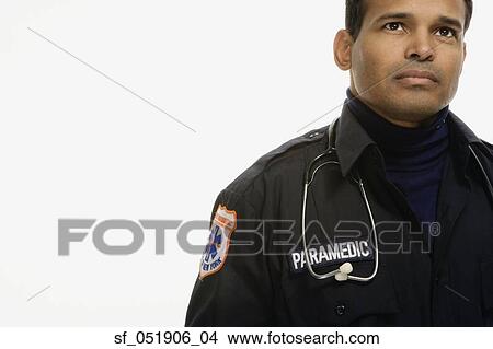 Studio shot of Hispanic male paramedic View Large Photo Image Picture - Studio shot of Hispanic male paramedic. Fotosearch