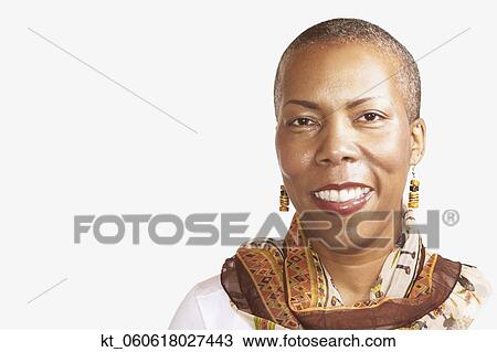 Studio shot of middle-aged African woman smiling View Large Photo Image Stock Image - Studio shot of middle-aged African woman smiling. Fotosearch