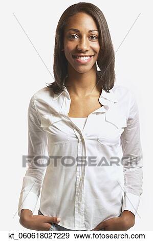 Studio shot of young African woman smiling View Large Photo Image Stock Photo - Studio shot of young African woman smiling. Fotosearch
