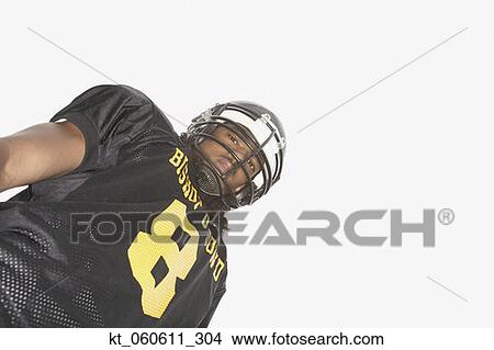 Young African man wearing football uniform View Large Photo Image Picture - Young African man wearing football uniform. Fotosearch