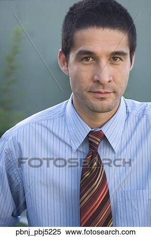 Close up of Hispanic businessman View Large Photo Image Stock Photography - Close up of Hispanic businessman. Fotosearch