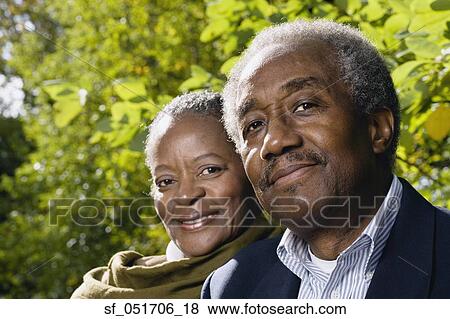 Stock Photo - Close up of senior African couple smiling outdoors. Fotosearch