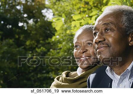 Close up of senior African couple smiling outdoors View Large Photo Image Stock Photo - Close up of senior African couple smiling outdoors. Fotosearch