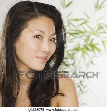 Close up of young Asian woman smiling View Large Photo Image Stock Photography - Close up of young Asian woman smiling . Fotosearch