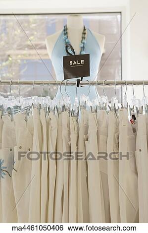 Stock Photograph - Sale rack at women's clothing store. Fotosearch