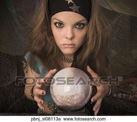 Woman dressed at fortune teller with crystal ball View Large Photo Image Stock Image - Woman dressed at fortune teller with crystal ball. Fotosearch