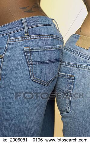 Close up of couple's rear ends touching in jeans View Large Photo Image Stock Photograph - Close up of couple's rear ends touching in jeans. Fotosearch