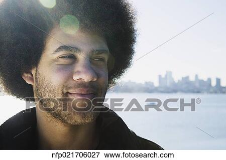 African man in front of city skyline View Large Photo Image Stock Photo - African man in front of city skyline. Fotosearch