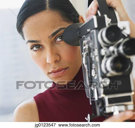 African woman using old fashioned film camera View Large Photo Image Stock Photo - African woman using old fashioned film camera. Fotosearch
